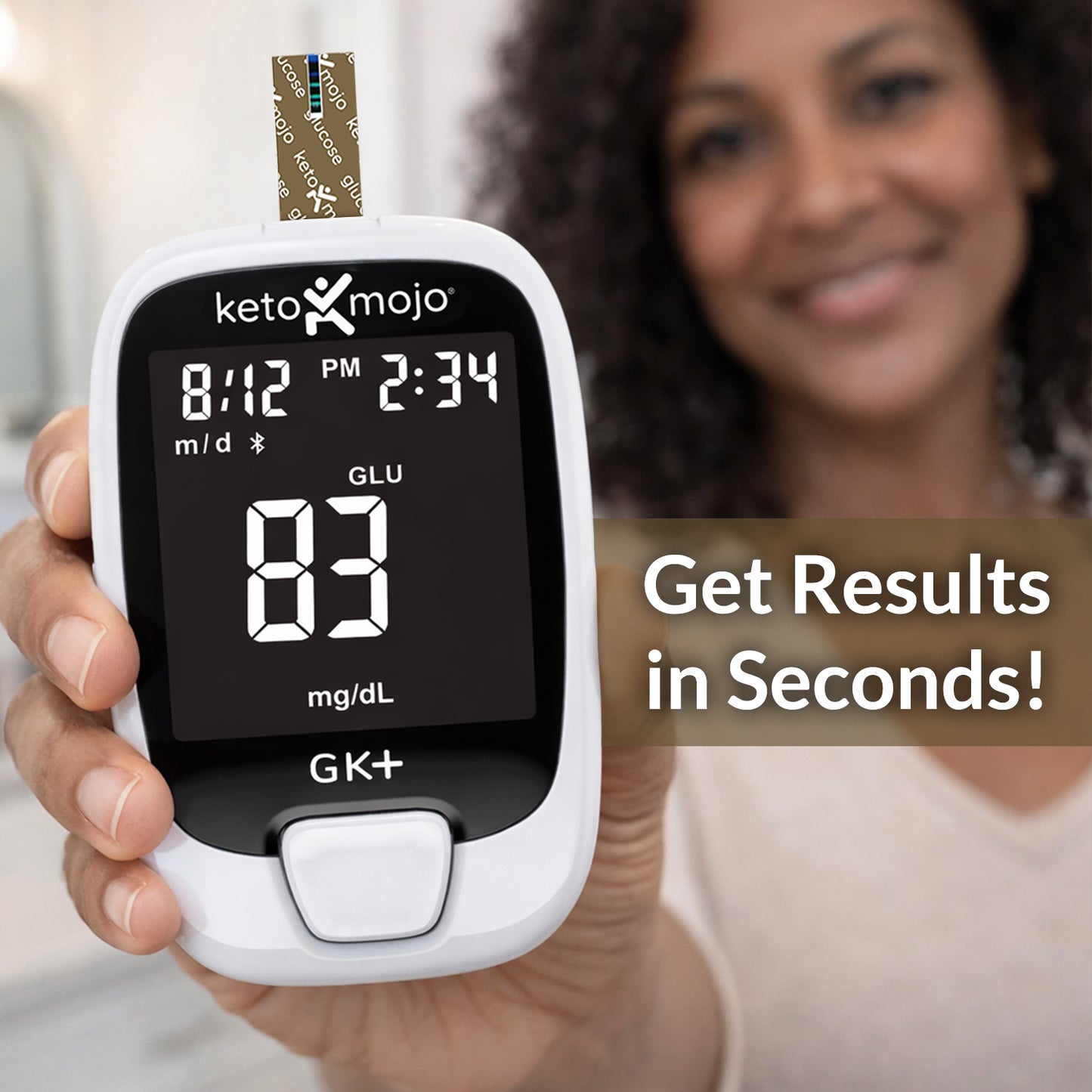 Woman using Keto-Mojo blood glucose meter for fast at-home glucose testing
