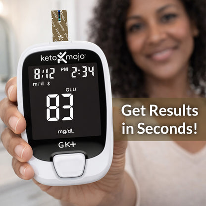 Woman using Keto-Mojo blood glucose meter for fast at-home glucose testing
